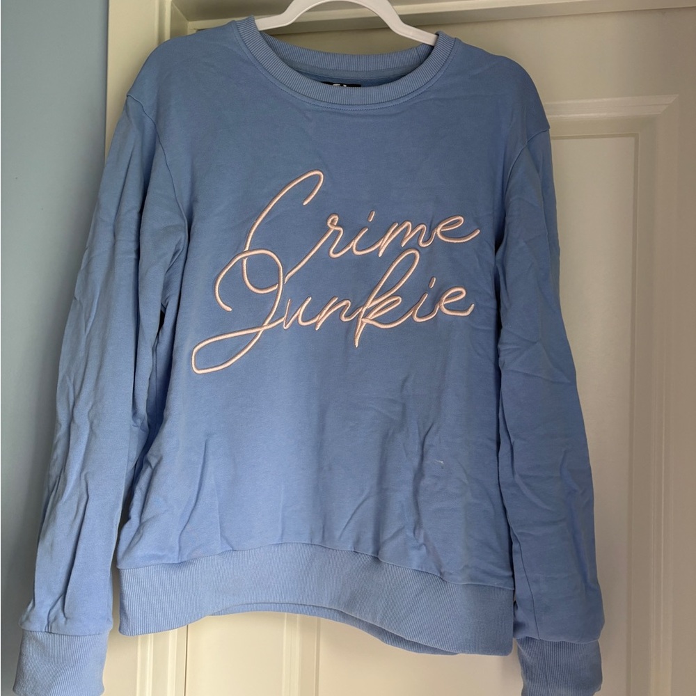 Crime Junkie Script Pullover Sweatshirt - Light Blue with White Embroidery